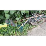 A gardening stool, various garden wares, shovels, rakes, hoses, etc. (a quantity)