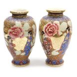 A pair of 20thC Japanese Satsuma vases, of baluster form, decorated with ladies in a garden with ove