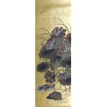 A 19thC Chinese scroll painting, of mandarin ducks and lotus flowers, on a gold ground, 133cm x 43cm