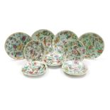 Four 19thC Chinese celadon and famille rose plates, decorated with birds, butterflies, and flwoers,