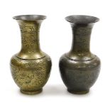 A pair of Chinese bronze vases, with engraved decoration of birds and flowers, six character Xuande