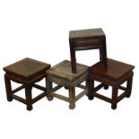 Four Chinese hardwood stools, of square section, raised on square legs, three united by box stretche