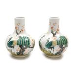 A pair of Chinese famille verte porcelain vases, of tapering necked, globular form, decorated with p