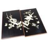 A pair of Japanese Meiji period black lacquer panels, worked in bone and mother of pearl, with birds