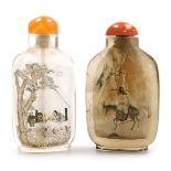 A Chinese inside painted snuff bottle, decorated to the obverse with figures in a house with trees,