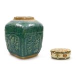 An early 20thC Chinese green Shiwan pottery ginger jar, of hexagonal form, decorated with panels of