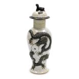 A 19thC Chinese crackle glaze vase and cover, of baluster form, decorated in relief with two Imperia