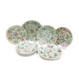 Four 19thC Chinese celadon and famille rose porcelain plates, decorated with birds, butterflies, and