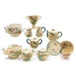 A group of early 20thC Japanese Satsuma teawares, decorated with flowers and birds, including teapot