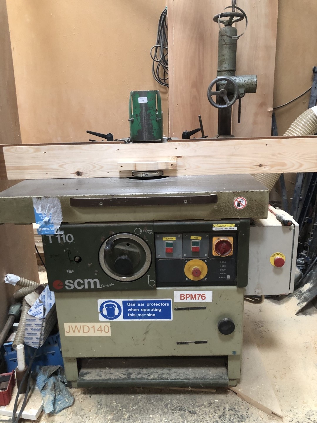 An SCM T110 spindle moulder, JWD140, with auto-feed.