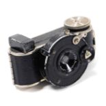 A Minifex patent miniature camera, by E Ludwig of Dresden, with a 2.5mm lens.