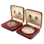 Two silver medals commemorating the life of Winston Churchill, 1874-1965, designed by F Kobacs, the
