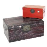 A Chinese hardwood trunk, 34cm high, 73cm wide, 46.5cm deep, together with a red lacquer box, 22cm h
