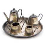 An Elizabeth II silver miniature tea and coffee set, comprising a circular tray, teapot, cream jug,
