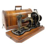A late 19thC Singer sewing machine, by the Singer Manufacturing Company, serial number 6081355/14505