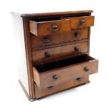 A Victorian mahogany apprentice chest, of two short over four long graduated drawers, 33.5cm high, 3