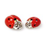 Two Saturno silver and enamelled ladybirds, each marked 925, 3.5cm and 3cm wide.