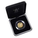 A 2007 Russian gold 50 rubles coin, the obverse with the emblem of The Bank of Russia, a two headed