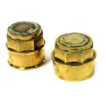 Two vintage brass wheel hub caps, for W Rainforth & Sons, Lincoln, 8cm and 7.5cm high respectively.