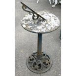 A Victorian cast iron sundial, raised on an octagonal column over a pierced circular base, 81cm high