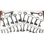 A selection of Victorian keys, in a Perspex fronted wooden wall mounted display case, case 35cm high