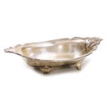 A George V Art Deco silver twin handled dish, with flared stylised handles and a gadrooned rim, rais