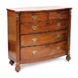 A late Georgian mahogany bow front chest, of two short over three long graduated drawers, raised on