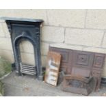 A Victorian black painted cast iron bedroom fire surround, with leaf decoration, 97cm high, 58cm wid