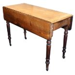 A late Georgian mahogany Pembroke table, with side drawer, raised on turned legs, on castors, 73cm h