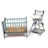 A Tri-ang blue painted wooden doll's cot, 58cm wide, together with a metamorphic child's chair, 59.5