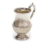 A Victorian silver tankard, of semi fluted baluster form, later presentation engraved, John Round &