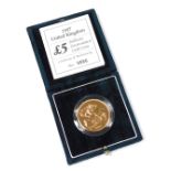 A 1997 United Kingdom £5 brilliant uncirculated gold coin, boxed with certificate, approximately 39.