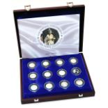 A Royal Mint Coronation and Anniversary silver proof collection, for the 50th Anniversary of Her Maj