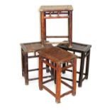 Four Chinese hardwood stools, with slatted seats, 46cm-50cm high, 38cm wide.