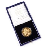 A 1996 United Kingdom gold proof crown, in presentation box with certificate no. 0508, 39.94g.