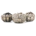 Three Indian white metal trinket boxes, each in the form of a pumpkin or other squash type fruit, of