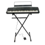 A Yamaha portable piano on stand, model no. YPR20, 93cm wide.