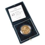 A 1996 United Kingdom brilliant uncirculated gold £5 coin, in presentation box with certificate no.