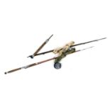 A German tank aerial fishing rod, fibre glass spinning rod and a Nottingham fishing reel, etc.