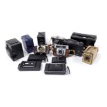 A group of vintage box and other cameras, including an Ensign camera number E29, Ensign Reflex camer