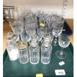 A quantity of glassware, including drinking glasses, etched glasses, cut glass etc. (two trays).