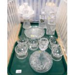 A quantity of glassware, including dessert dishes, four decanters, one being a ship's decanter, a la