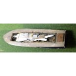 A large scratch built boat, approx 105 cm in length.