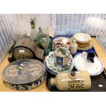 A quantity of glassware, ceramics, including a foot warmer and a mantel clock. ( 3 trays and loose).