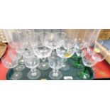 Glass items to include etched glass, champagne coupes, etc. (a quantity)
