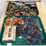 A quantity of plastic soldiers, metal models of ships, and a Lancaster Bomber. (2 trays)