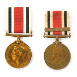 Two Special Constabulary Faithful Service medals, comprising a George VI medal named to Benjamin Hol