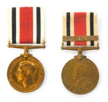 Two Special Constabulary Faithful Service medals, comprising a George VI medal named to Benjamin Hol