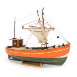 A 20thC model fishing boat, painted orange and green, named The Rebecca Mary, BM32, on stand, 45cm h