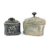 Two 19thC lead tobacco jars, one of sarcophagus form, the lid decorated with vine leaves and grapes,